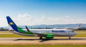 RwandAir Boeing 737-800 and Airbus A330-200 at Kigali International Airport symbolizing RwandAir fleet expansion.