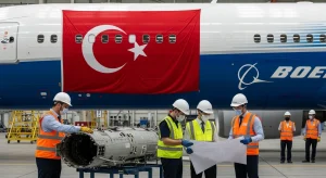 Boeing aircraft with Turkish aerospace engineers at Istanbul Teknopark, symbolizing $2B procurement milestone.