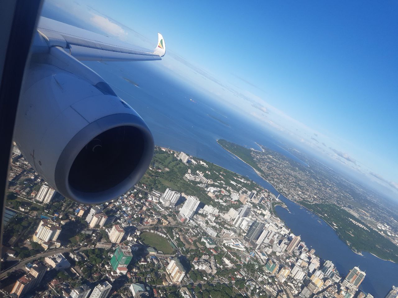 An Ethiopian Airlines jet at an African air-space symbolizing aviation growth in Africa with improved visa openness and passenger experience.